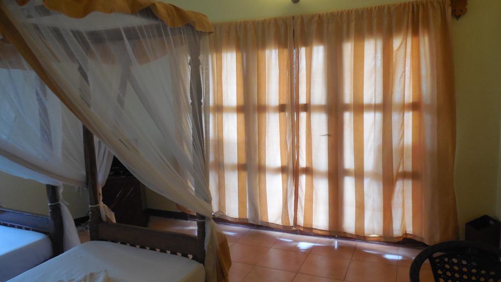 Arabian Nights Suites Hotel Paje Ruang foto